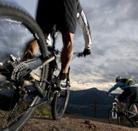 2 persons biking 2 persons biking