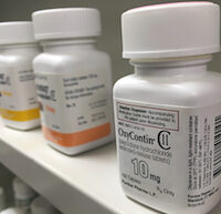 a bottle of OxyContin pills